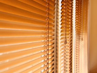 Mini blinds installed on windows, enhancing interior decor with a modern touch.